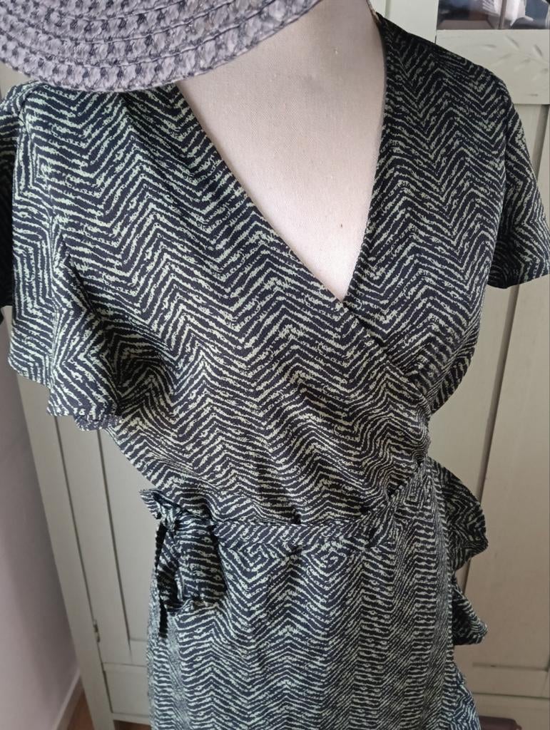 Wikkeljurk Pigalle XL, Ophalen of Verzenden, Zo goed als nieuw, Maat 46/48 (XL) of groter, Onder de knie