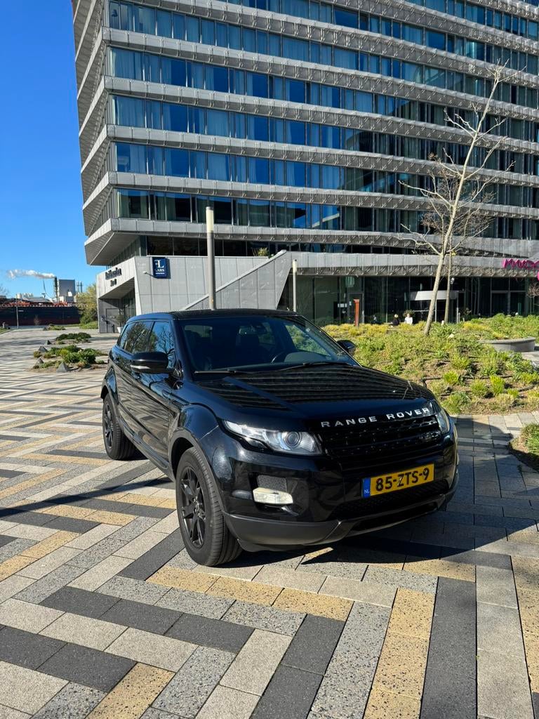 Land Rover Range Rover Evoque 2.2 TD4 4WD AUT 2014 Zwart, Auto's, Automaat, 15 km/l, 1800 kg, 4 cilinders