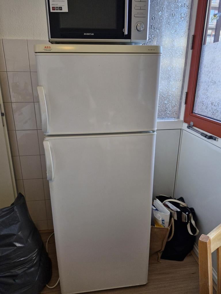 Koelkast met vriesvak boven, Ophalen