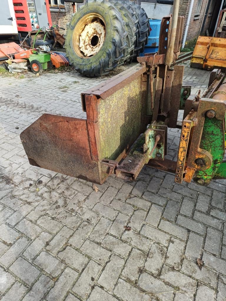 Schepbak, grondbak, pz bak, Ophalen