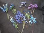 Zijden bloemen blauw/paars, Ophalen
