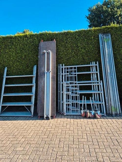 Mooi aluminium rolsteiger werkhoogte 10 20, Doe-het-zelf en Verbouw, Steigers, Gebruikt, Rolsteiger of Kamersteiger, 5 meter of hoger