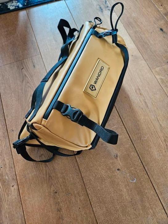 Gele wandrd 9l sling.  In mooie staat, Audio, Tv en Foto, Fotografie | Fototassen, Zo goed als nieuw, Rugtas, Overige merken, Ophalen of Verzenden