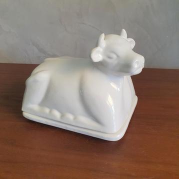 Vintage grote boterkoe in doos wit beschikbaar voor biedingen