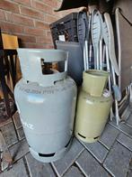 2 lege gasflessen, Ophalen