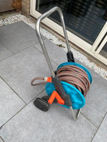 Gardena tuinslang met haspel/wagen beschikbaar voor biedingen