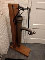 Oude koperen pomp, Ophalen