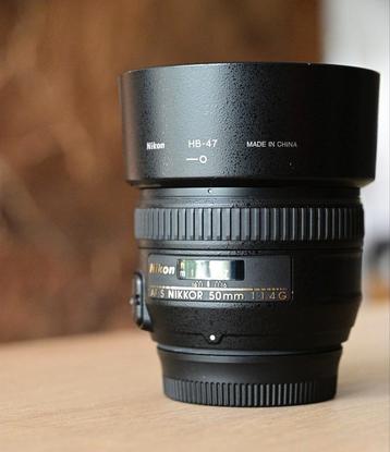 Nikon AF-S NIKKOR 50mm f/1.4G – inclusief zonnekap & pouch beschikbaar voor biedingen