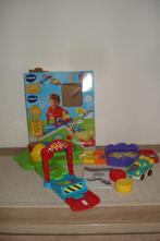 Vtech toet toet auto lanceerbaan en auto en doos., Ophalen of Verzenden, 2 tot 4 jaar