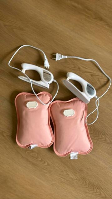 Living Needs- Set van 2 elektrische kruikjes - roze beschikbaar voor biedingen