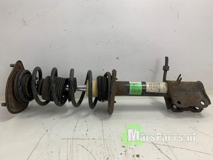 Schokdemperpoot rechts-voor van een Mitsubishi Colt, Auto-onderdelen, Ophanging en Onderstel, Mitsubishi, Gebruikt, 3 maanden garantie