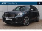BMW iX1 eDrive20 High Executive M Sport / Panoramadak / Trek, Auto's, BMW, Met garantie (alle), 24 min, Origineel Nederlands, 363 min