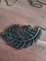 Vintage ketting met hanger, merk Avon., Ophalen of Verzenden, Gebruikt, Overige materialen, Met hanger