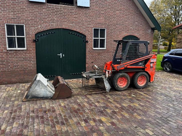 Thomas schranklader, bobcat met mestgrijper, Zakelijke goederen, Machines en Bouw | Kranen en Graafmachines, Wiellader of Shovel