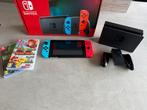 Switch V2 2019 + 2 spellen, Spelcomputers en Games, Online, Overige genres, Ophalen of Verzenden, Zo goed als nieuw