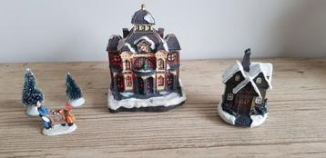 Een kerst dorpshuisje  met lichtjes. beschikbaar voor biedingen