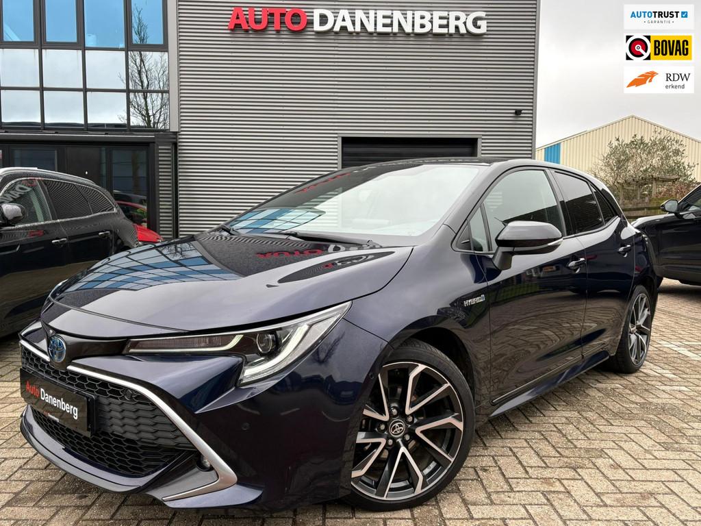 Toyota Corolla 1.8 Hybrid GARANTIE, Auto's, Zwart, Blauw, Corolla, 122 pk