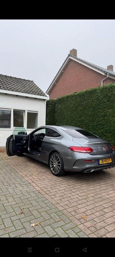 Mercedes-Benz C-Klasse 2.0 C200 Coupe AUT 2016 Grijs, Auto's, Achterwielaandrijving, 1800 kg, 4 cilinders, 4 stoelen