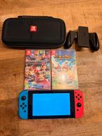 Switch met 2 spellen en opbergbox, Spelcomputers en Games, Spelcomputers | Nintendo Switch, Ophalen of Verzenden, Zo goed als nieuw