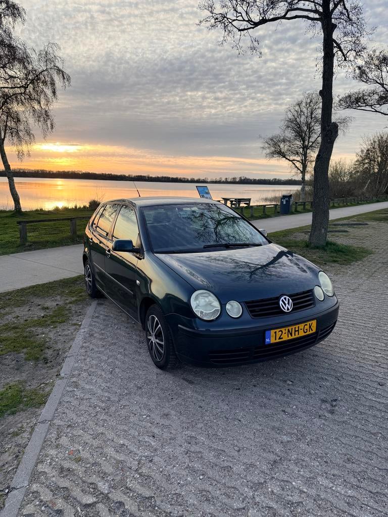 Volkswagen Polo 1.4 55KW 2003, Auto's, Voorwielaandrijving, Mistlampen, 4 cilinders, Origineel Nederlands