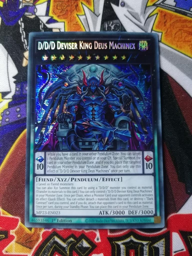 D/D/D Deviser King Deus Machinex -	Secret Rare MP23 - YGO, Ophalen of Verzenden, Zo goed als nieuw, Foil