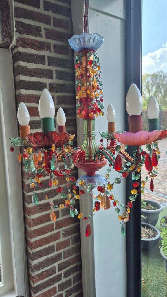 Leuke gekleurde kroonluchter, Ophalen