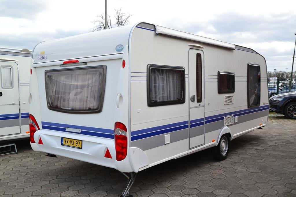 Hobby 560 Excellent - Nieuw model - Airco - Queenbed - TV -, Caravans en Kamperen, Caravans, Vast bed, Bedrijf, Info@selectcars.nl