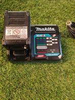 MAKITA 40 VOLT ACCU EN LADER met garantie, Ophalen of Verzenden, Zo goed als nieuw