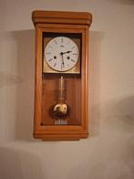 Blank eiken wandklok, Ophalen