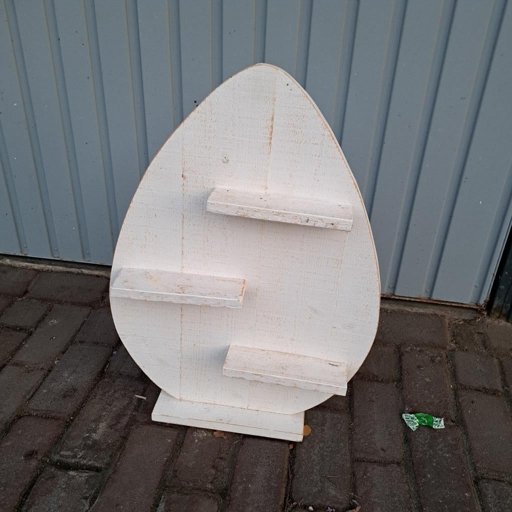 Houten Paasei, Ophalen