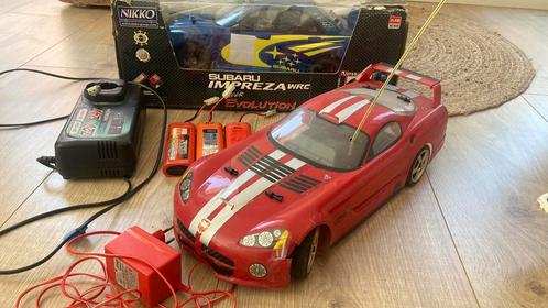 Nikko super evolution 1:10, Hobby en Vrije tijd, Modelbouw | Radiografisch | Auto's, Gebruikt, Auto onroad, Elektro, Ophalen of Verzenden