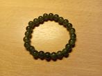 Rekbare Olijfgroene Peridoot kralen armband., Sieraden, Tassen en Uiterlijk, Armbanden, Ophalen of Verzenden, Nieuw, Groen, Overige materialen