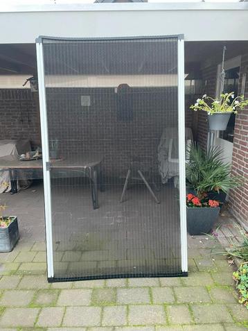 2 plissé Hordeuren 2.25 meter hoog  beschikbaar voor biedingen