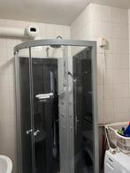 Douchecabine met functies, Ophalen