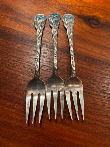 Verzilverse gebaksvorkjes beschikbaar voor biedingen