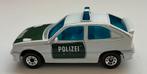 Matchbox Opel Kadett GSI Polizei zo goed als nieuw uit 1985, Hobby en Vrije tijd, Modelauto's | Overige schalen, Ophalen of Verzenden
