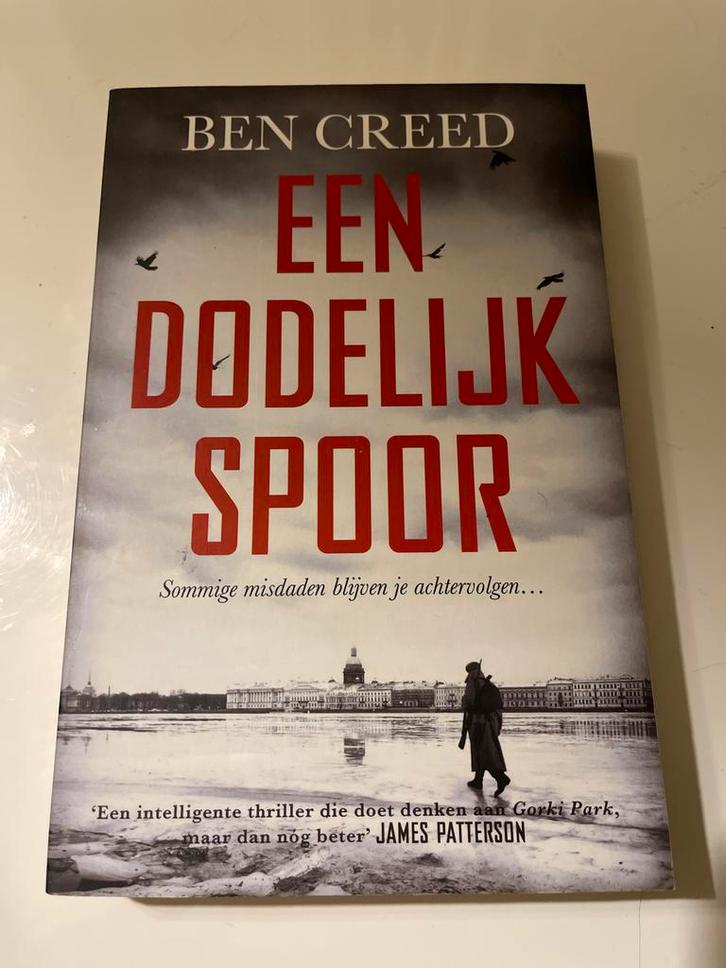 Een Dodelijk Spoor - Ben Creed, Boeken, Thrillers, Zo goed als nieuw, Nederland, Ophalen of Verzenden