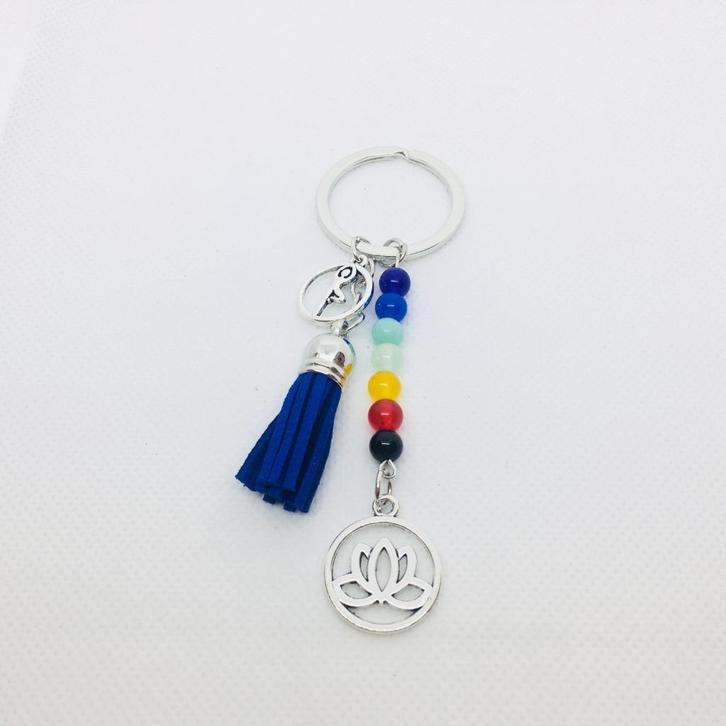 Chakra sleutelhanger met lotus en blauw suède kwastje, Verzamelen, Sleutelhangers, Nieuw, Ophalen of Verzenden