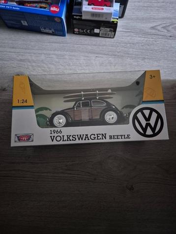 Motor Max VW Kever Woody met surfplanken beschikbaar voor biedingen