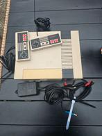 Nintendo met 4 spelcasettes en 7 spellen, Ophalen of Verzenden, Gebruikt, Met 2 controllers
