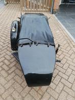 Zijspan met bladveren., Ophalen