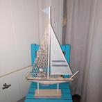 Bootje van hout met zeiltje en schelpennetje, Ophalen, Gebruikt