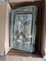 Volvo 240/244/245 nieuwe koplamp rechts orgineel, Ophalen, Nieuw, Volvo