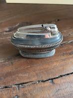 Ronson tafelaansteker, Ophalen