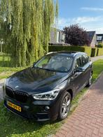 BMW X1 25I Xdrive pano Aut8 2017 Zwart, Auto's, 1998 cc, 15 km/l, Beige, 4 cilinders