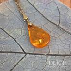 Vintage Barnsteen Hanger Aan Goudkleurige Ketting, Ophalen of Verzenden, Zo goed als nieuw, Steen of Mineraal, Met edelsteen