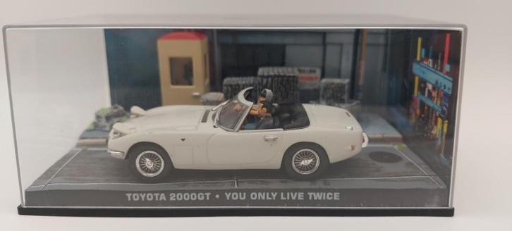 #7 Toyota 2000GT James bond auto met boekje, Hobby en Vrije tijd, Modelauto's | 1:43, Nieuw, Auto, Universal Hobbies, Verzenden