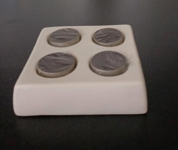 Nieuwe stenen waxinelichthouder met 4 zwarte waxinelichtjes beschikbaar voor biedingen