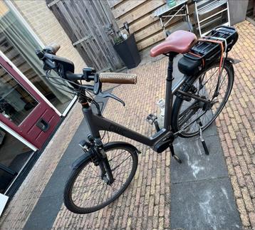 Qwic premium M7 met kapotte batterij beschikbaar voor biedingen