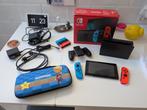 Nintendo Switch + case en travel dock, Spelcomputers en Games, Spelcomputers | Nintendo Switch, Gebruikt, Zonder controller, Met harde schijf